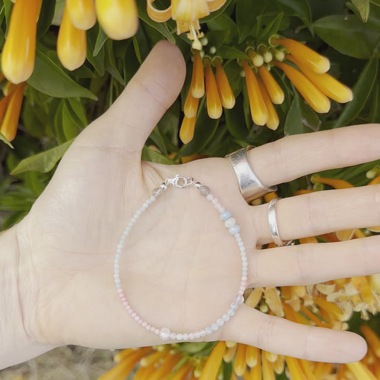 One-of-a-kind natural crystal designer bracelet with sterling silver hardware, designed & handmade in California. Stones are Amazonite, Freshwater Pearl, Labradorite, Morganite, Pink Coral, & Rose Quartz.