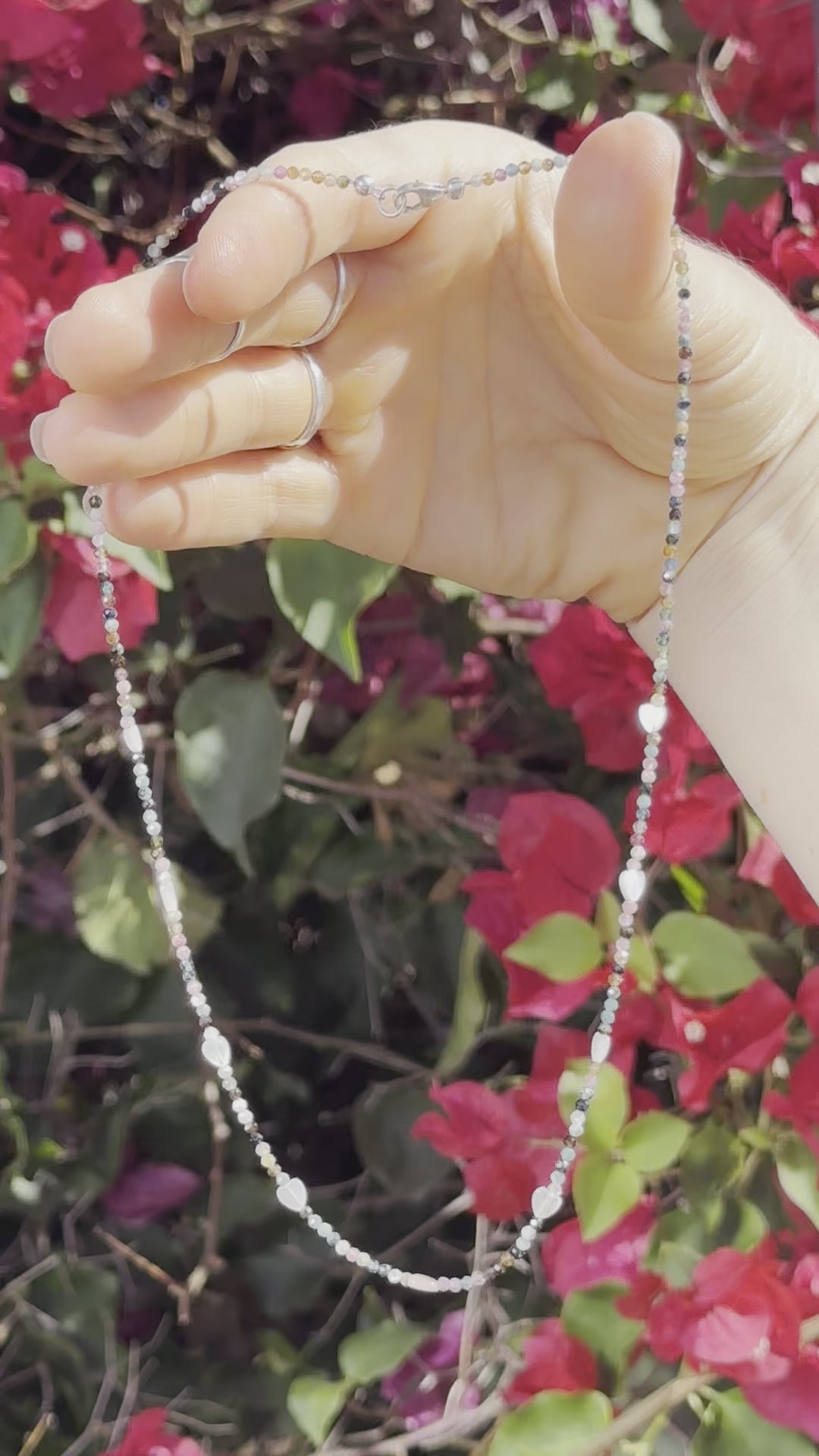 One-of-a-kind natural Mother of Pearl & Green, Black, Clear, & Pink Tourmaline crystal designer bracelet with sterling silver hardware, designed & handmade in California.